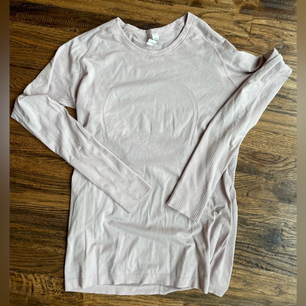 Light pink lululemon swiftly tech long sleeve shirt